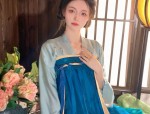 The Charm of Short-Length Cheongsam with Blue and White Porcelain Pattern