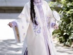 Winter Qipao Style:The Charm of Pairing a Skirt with a Half-Length Inner Dress