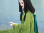 Elegant Young Girl in a Stylish Slit Cheongsam Dress Thin and Chic