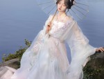 The Enchanting Charm of Xiangyun Silk Cotton Cheongsam