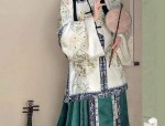 The Enigma of Gu Xuan Nas Cheongsam:A Journey Through Traditional Chinese Elegance