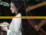A Girl Child in Hanfu Costume Celebrating the Lantern Festival