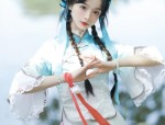 Elegant Young Girl in a Stylish Slit Cheongsam Dress Thin and Chic