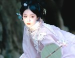 The Dominating Presence of a Traditional Hanfu Student in Ancient Attire