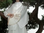 The Enchantment of Cheongsam and Long Earrings:A Cultural Fusion of Elegance and Fashion