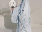 Little Girl in a Splendid Horse-Face Skirt and Traditional Headwear:A Cultural Journey
