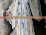 The Cultural Journey of Chinas Red Cheongsam:A Return to the Maternal Home