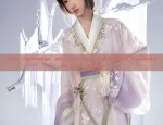 Short-Style Golden Silk Qipao with a Cheongsam Charm