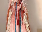 The Revival of Cheongsam with Open Cardigan:A Fashionable Blend of Tradition and Modernity