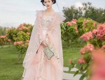 A Summer Tale of the Little Girl in Traditional Chinese-Style Hanfu Dress and Horseface Skirt