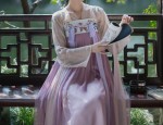 The Art of Styling a Shawl with a Black Cheongsam