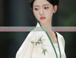 The Allure of a Pure-Colored Traditional Tang Suit Woman