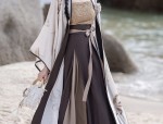 The Elegance of a Cape-Clad Cheongsam Woman