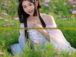 A Girl Child in Hanfu Costume Celebrating the Lantern Festival