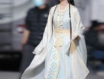 The Little Girl in Red Hanfu Shoes