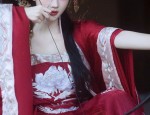 Embracing Seduction in a Short,Tight-fitting Cheongsam with Splits