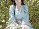 The Cheongsam with a Hooded Cape:A Blend of Traditional Elegance and Modern Style
