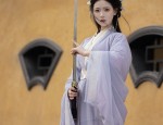 The Enchanting Allure of a Purple Swallow-Tail Cheongsam