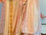 The Enchantment of Hooded Cape and Puff-skirt:A Fashionable Fusion of Traditional Elegance