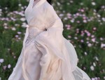 The Enchantment of a Red Qipao for an Engagement Ceremony:A Long-Standing Tradition
