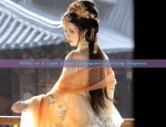 Petite in a Light Green Cheongsam:Embracing Elegance