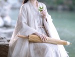 The Enchanting Allure of a Purple Swallow-Tail Cheongsam