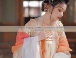 The Art of Cheongsam Edging and盘扣:A Traditional Symbol of Chinese Clothing