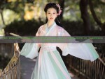 The Charm of Black Open-Front Cardigan Over Cheongsam