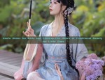 The Enigma of a Sword-Wielding Female Hero in Traditional Chinese Hanfu Clothing