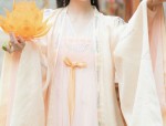 Embracing Seduction in a Short,Tight-fitting Cheongsam with Splits