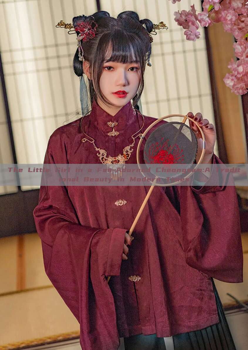 The Little Girl in a Fan-Adorned Cheongsam:A Traditional Beauty in Modern Times The Little Girl in a Fan-Adorned Cheongsam:A Traditional Beauty in Modern Times