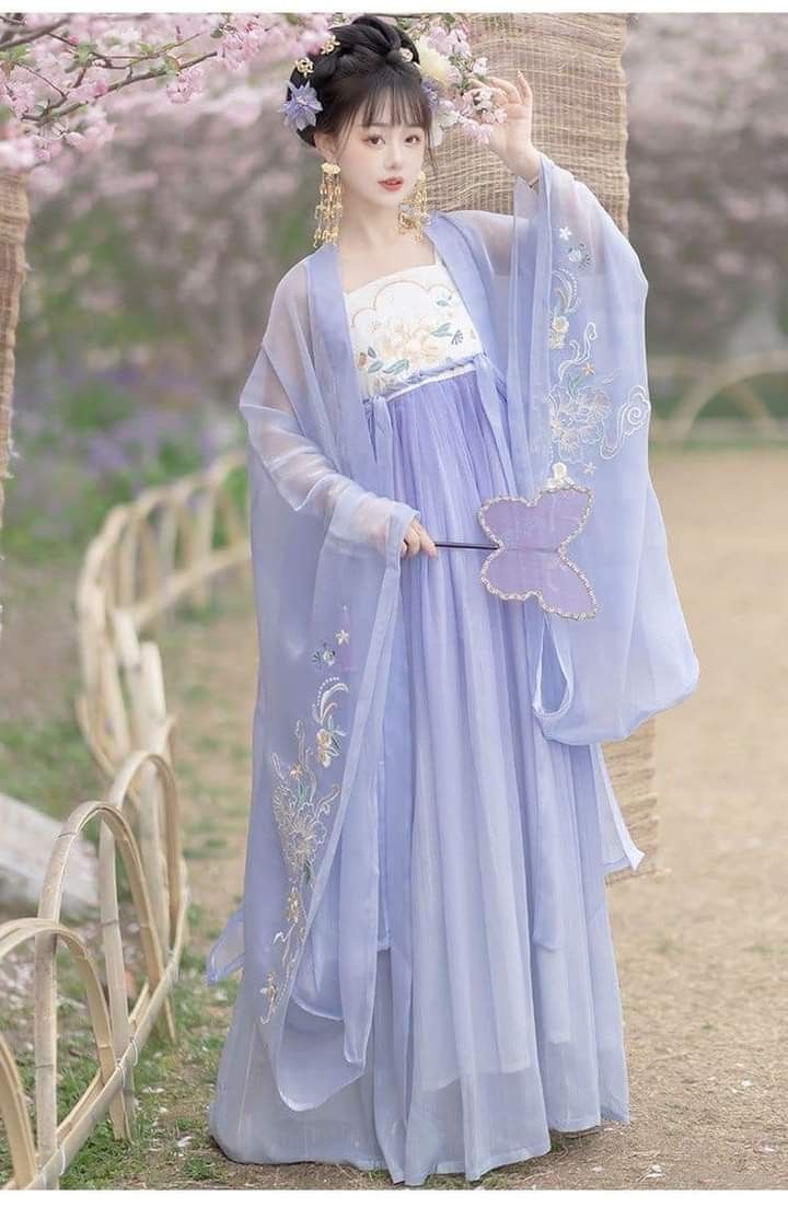 Embracing Elegance:The Allure of V-Neck Cheongsam Skirts with Deep V-Cuts Embracing Elegance:The Allure of V-Neck Cheongsam Skirts with Deep V-Cuts
