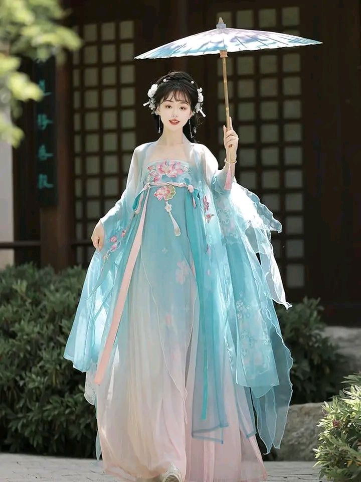 Orange-Red Revamped Cheongsam:A Fashionable Journey Through Traditional Elegance Orange-Red Revamped Cheongsam:A Fashionable Journey Through Traditional Elegance
