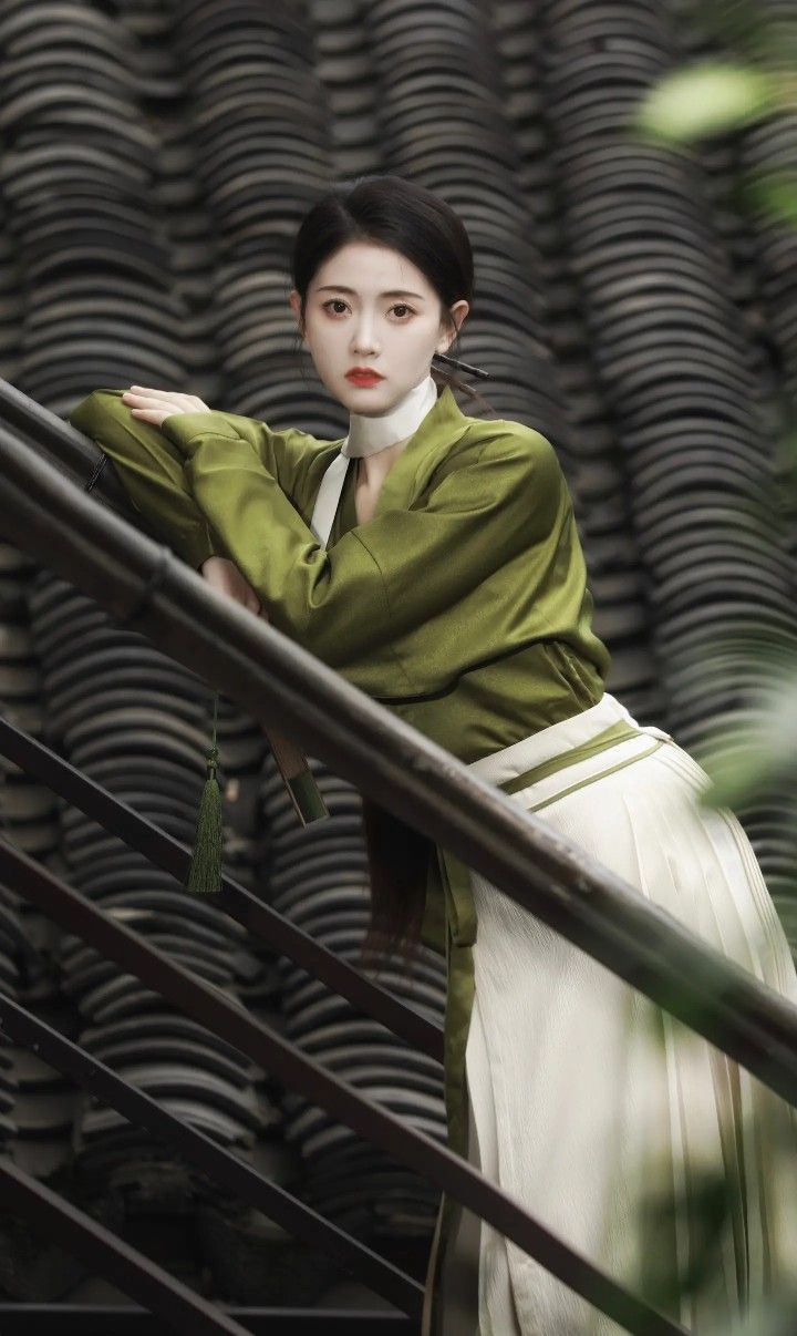 Embracing Modernity in a Chinese Red Revamped Cheongsam Embracing Modernity in a Chinese Red Revamped Cheongsam